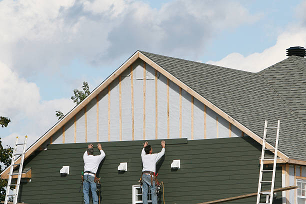 Professional Siding Contractor technician working in Wheaton, IL